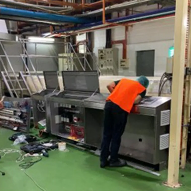 Technician commissioning a packaging machine